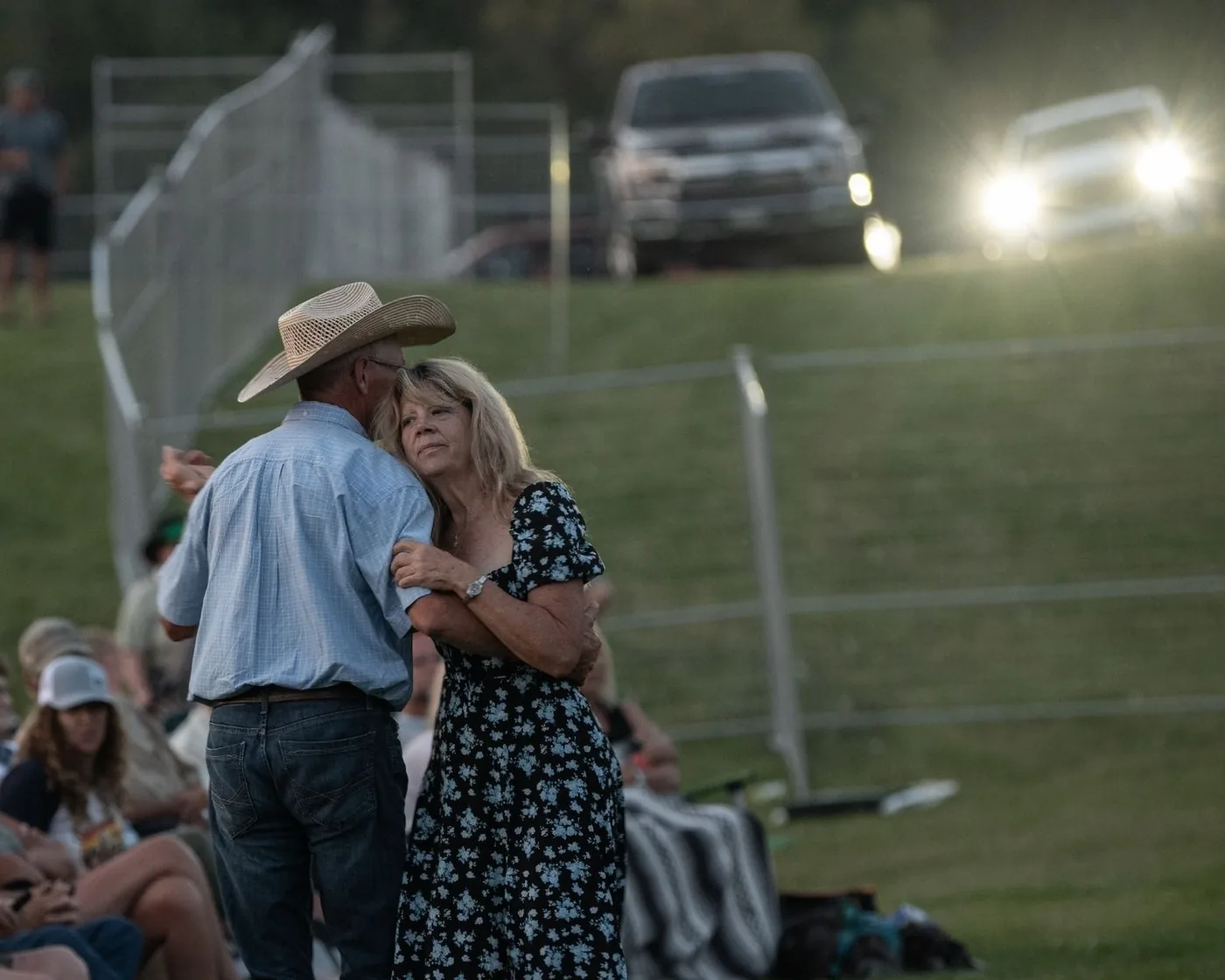 A couple dancing together on the festival grounds in 2025