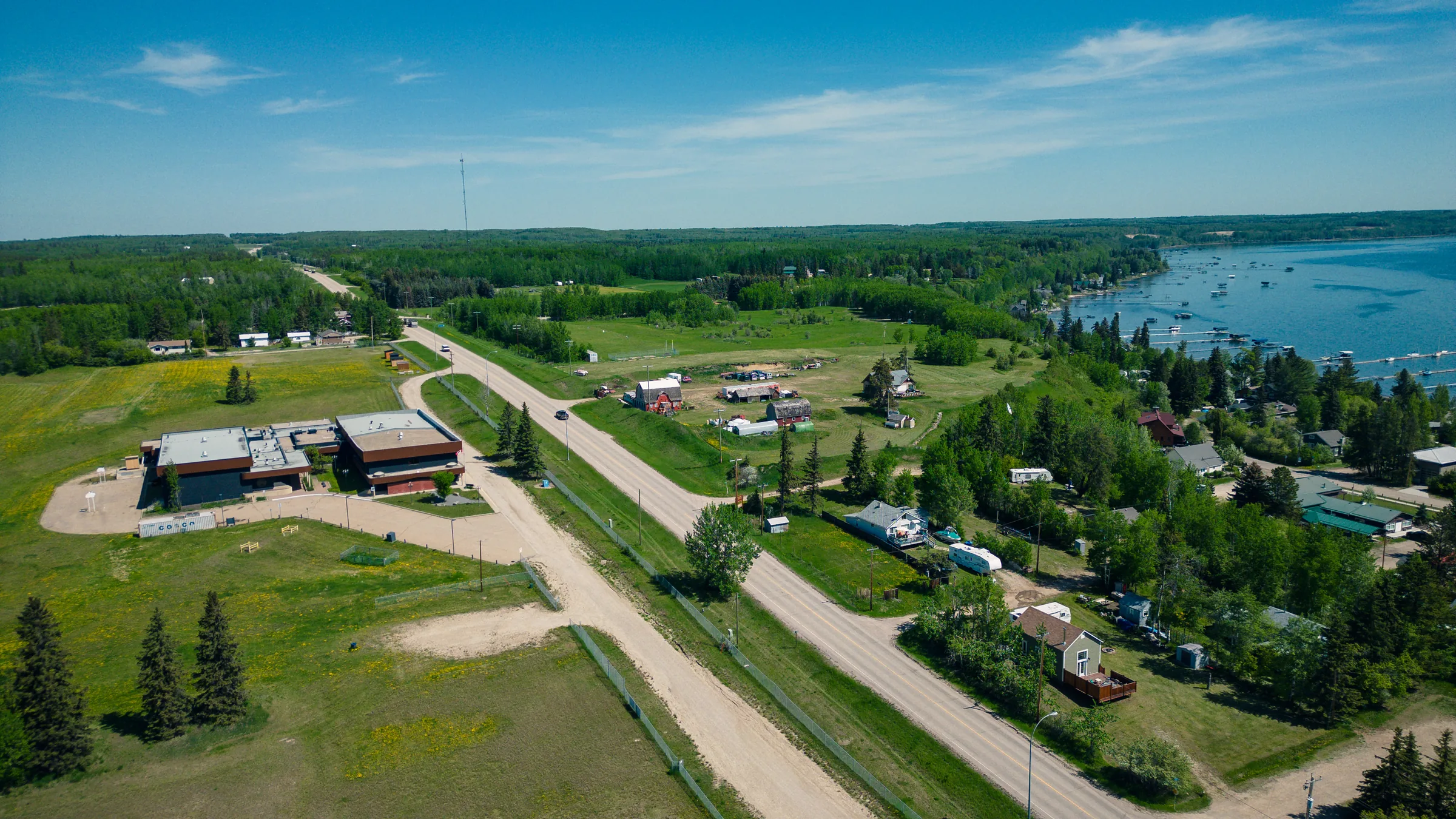 Aerial view of SebaHub School grounds and the surrounding lake country in Seba Beach